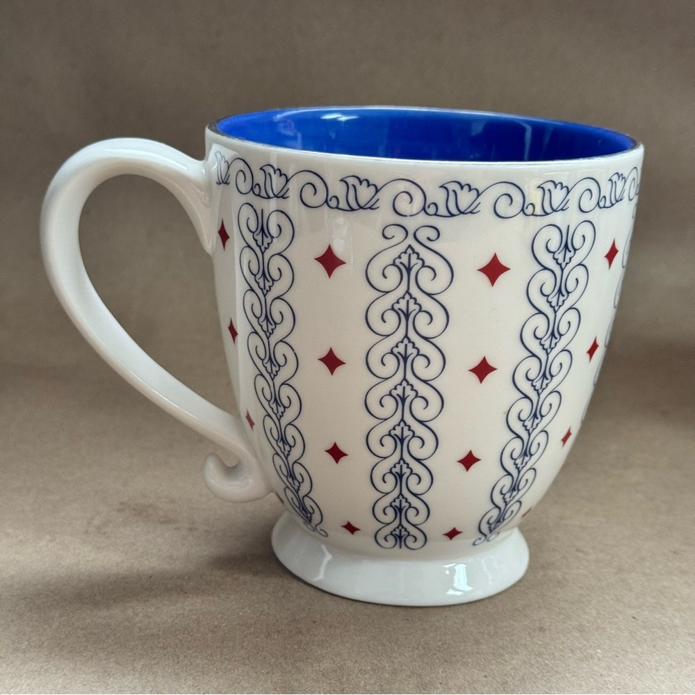 Starbucks 2003 Barista red, white, and blue scroll design footed mug. 16 fl oz.